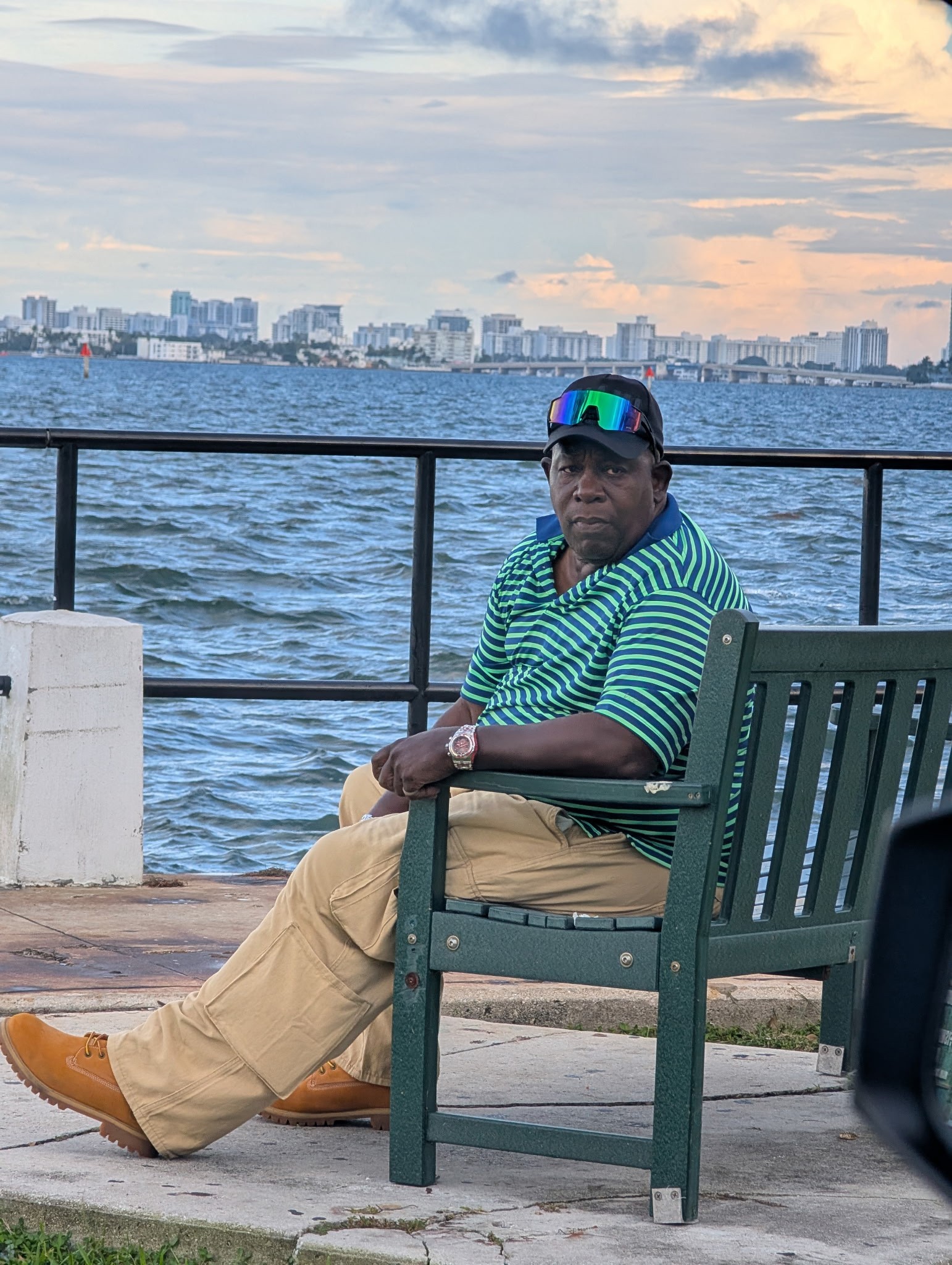 By the water.